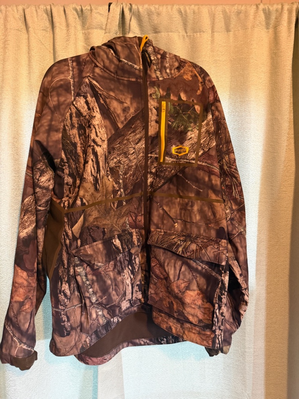 Yukon Realtree Camouflage Hunting Jacket with Yellow Zip Accent